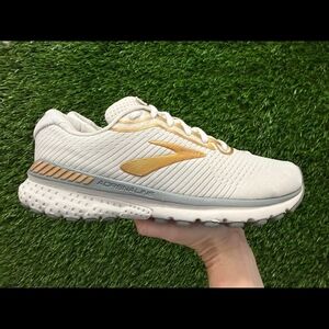 Brooks Women’s White Running Shoe with Gold Accents